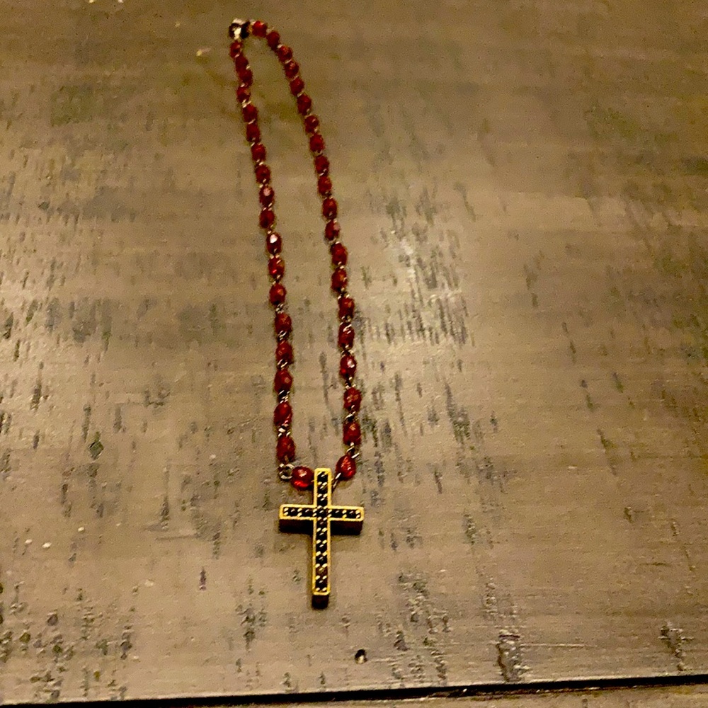 Short red beaded necklace with gold cross pendant